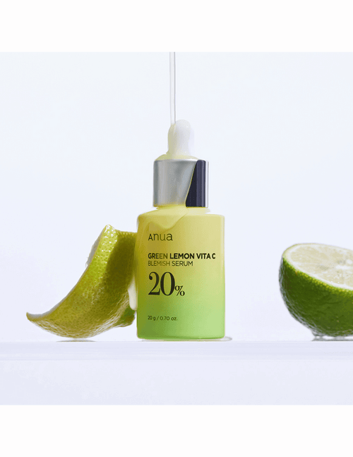 ANUA Green Lemon Vitamin C Blemish Serum bottle with fresh lemon slices, enhances skin radiance and targets hyperpigmentation.