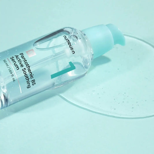 Numbuzin No.1 Pantothenic B5 Active Soothing Serum bottle on blue background with serum drop