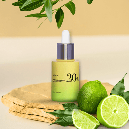 ANUA Green Lemon Vitamin C Blemish Serum with green lemons, highlighting brightening skincare effects.