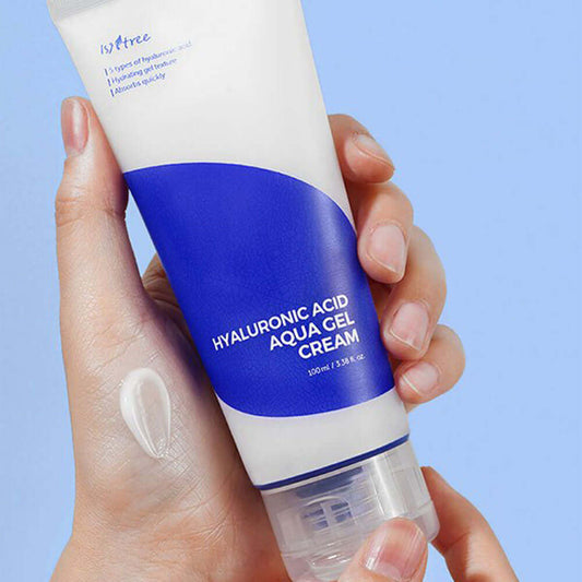 Isntree Hyaluronic Acid Aqua Gel Cream tube in hand, showcasing lightweight gel texture and hydrating properties for oily skin.