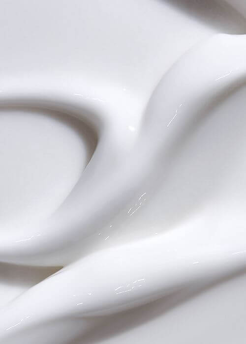 Close-up of creamy white texture, showcasing the smooth consistency of ETUDE HOUSE Soonjung 2x Barrier Intensive Cream.
