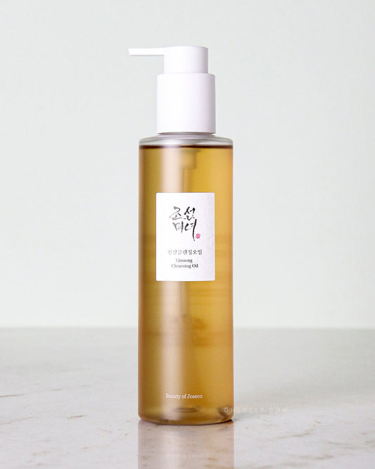 Beauty of Joseon Ginseng Cleansing Oil in a clear bottle on a marble surface, perfect for all skin types.