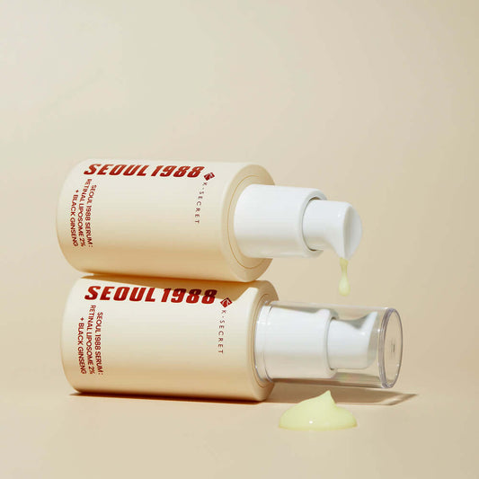 KSECRET SEOUL 1988 Serum bottles showcasing retinal liposome and black ginseng for anti-aging benefits.