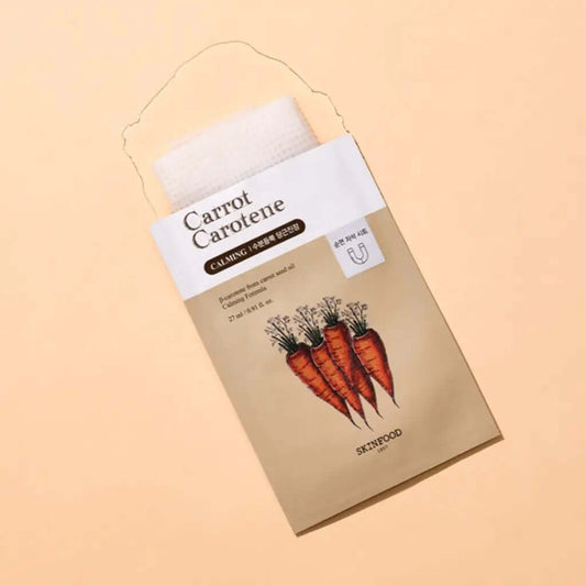 Skinfood Carrot Carotene Mask packaging featuring fresh carrots for calming skincare benefits.