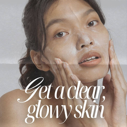 Woman with radiant skin applying skincare, promoting a clear and glowy complexion.