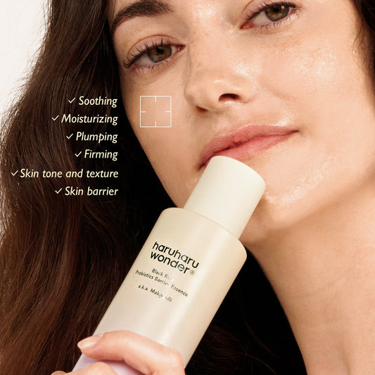 Haruharu Wonder Black Rice Probiotics Barrier Essence 120ml applied to skin for hydration and barrier support.