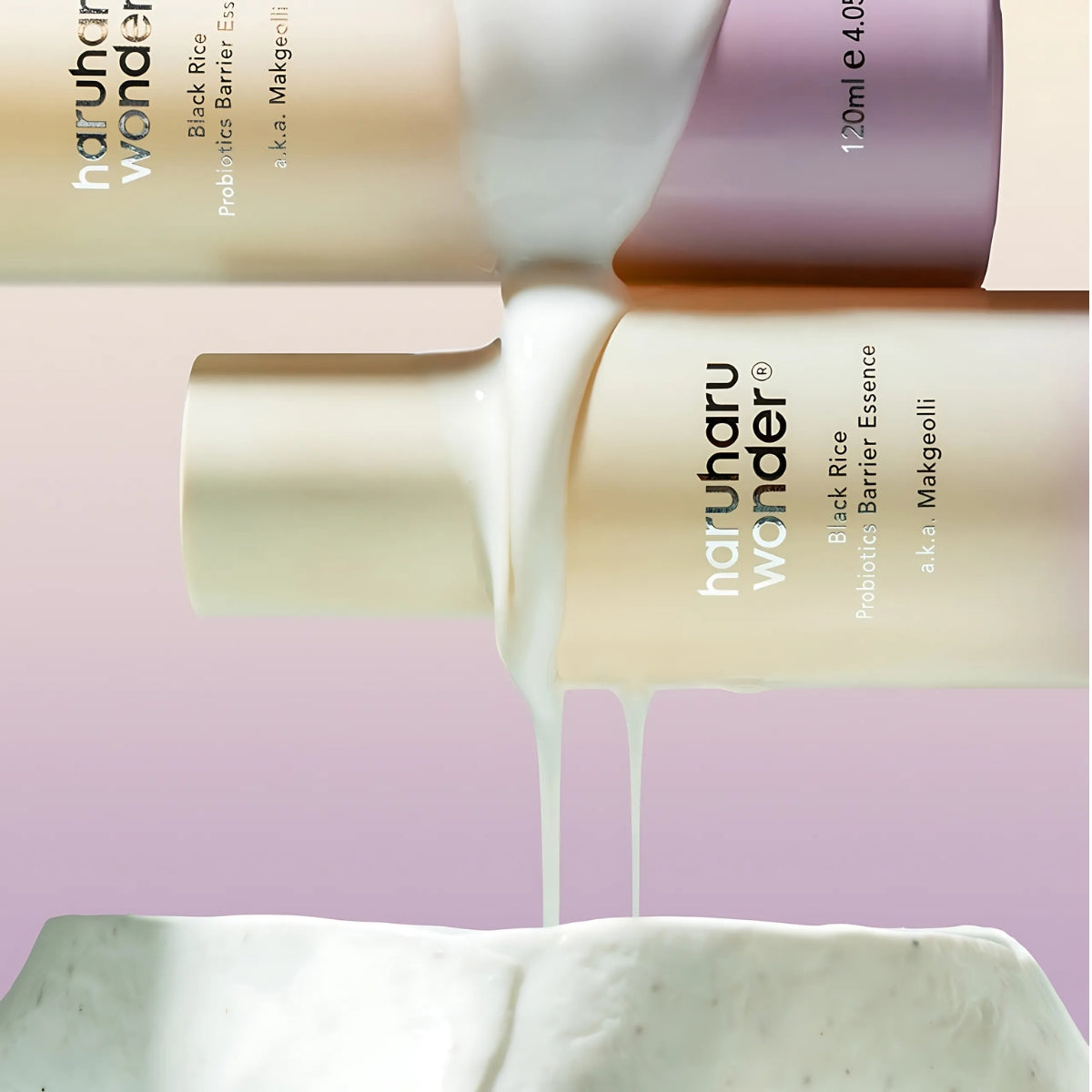 Haruharu Wonder Black Rice Probiotics Barrier Essence 120ml bottles with creamy essence dripping, showcasing skincare benefits.